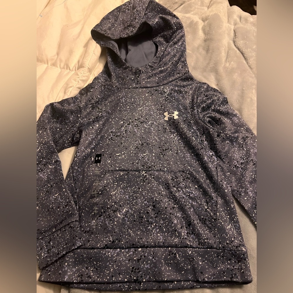 Brand new under armour girls sweatshirt. Purple splatter coloring. Still has tag
